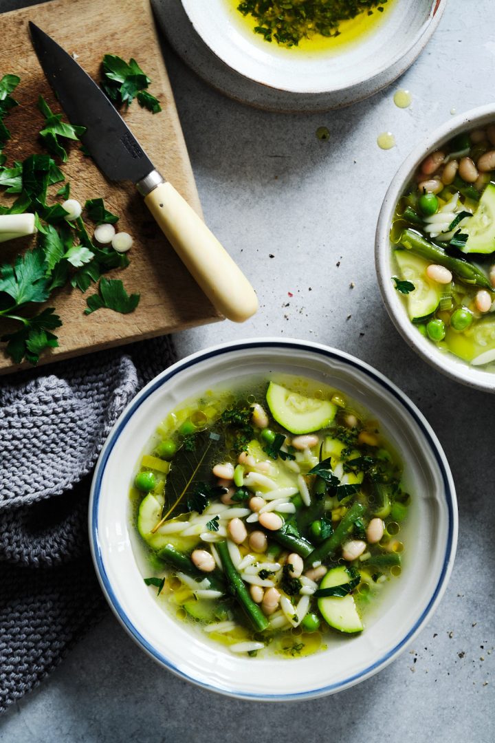 Green minestrone soup with herb and lemon sauce