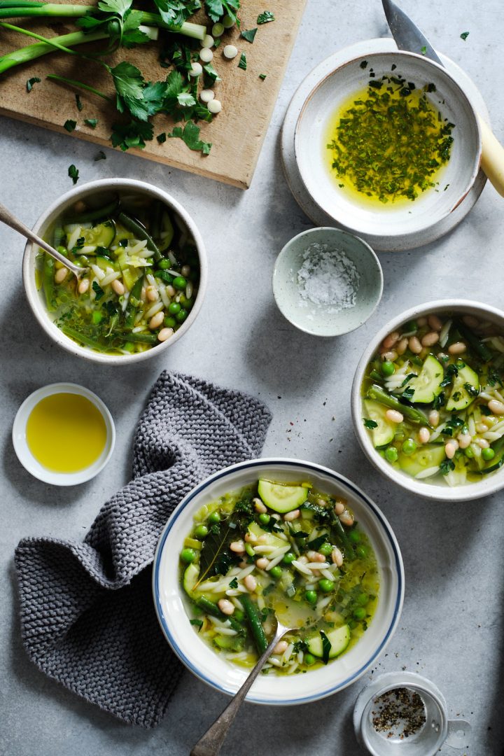 Green minestrone soup with herb and lemon sauce
