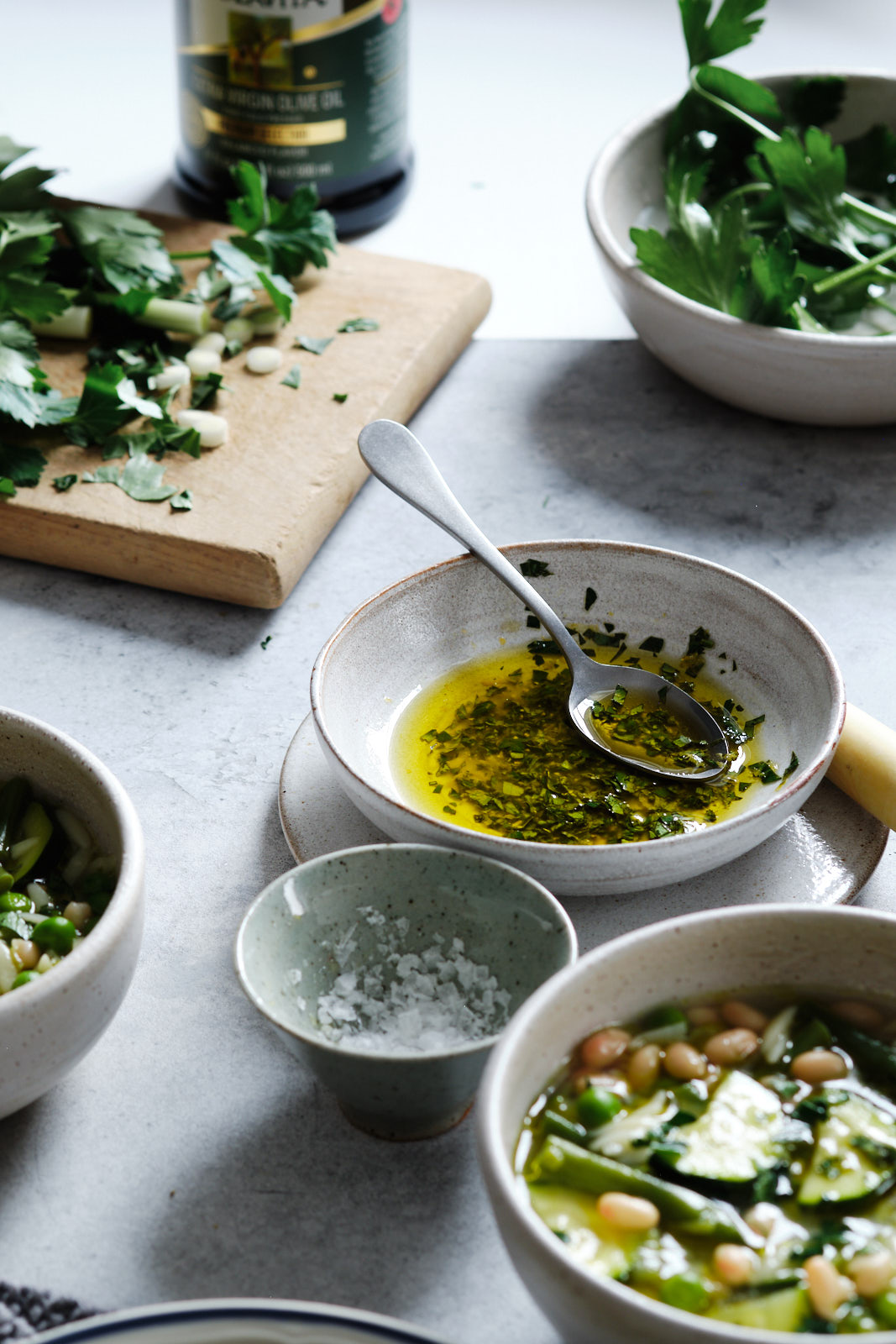 Herb, lemon, and olive oil sauce to serve with green minestrone soup