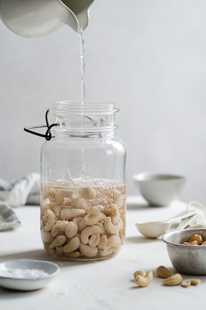 Cashews being soaked in water