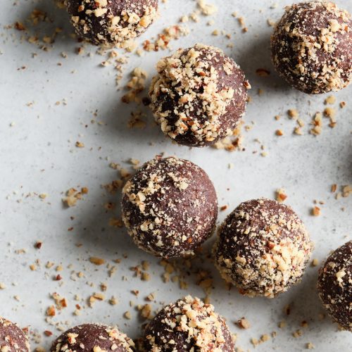 Easiest chocolate energy bites, rolled in finely chopped nuts